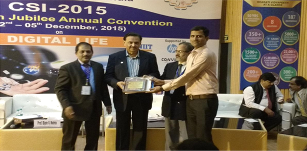 Mr. A. V. Kolapkar receiving Longest Continuous Student Branch Counselor Award